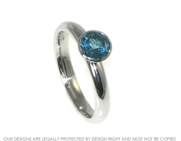 Bespoke platinum 1.09cts 6mm london blue topaz engagement ring. 