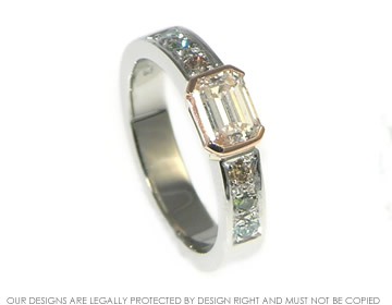 Bepoke platinum engagement ring with natural and heat-treated coloured and white diamonds.