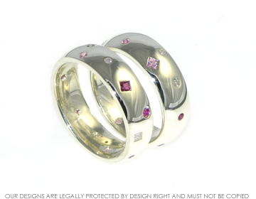 9ct white gold commitment ring with scatter set princess and brilliant cut stones in diamonds , pink sapphires and rubies.