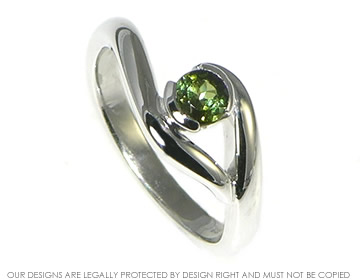 Bespoke 9ct white gold twist style engagement ring with 0.30ct brilliant cut green tourmaline.