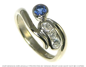 Bespoke 18ct white gold, diamond and blue sapphire engagement ring inspired by the night sky