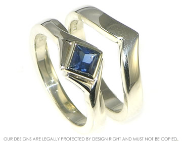 Bespoke 9ct white gold with a princess cut sapphire.