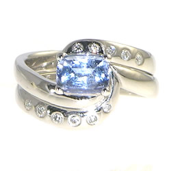 swirling water inspired fitted sapphire and diamond engagement and wedding ring set