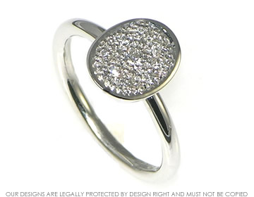 White gold antique inspired engagement ring with pave diamonds