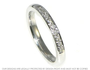 9ct white gold wedding ring with nine grain set diamonds 