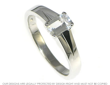 White topaz emerald cut solitaire engagement ring