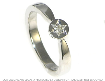 Star inspired white gold engagement ring with trilliant 0.07cts diamond