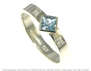 White gold aquamarine and diamond engagement ring