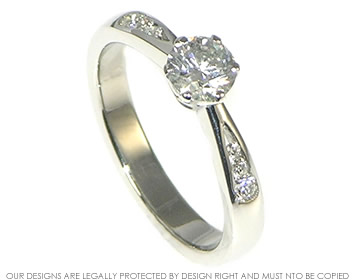 Bespoke platinum brilliant cut 0.51 G VS diamond engagement ring. 