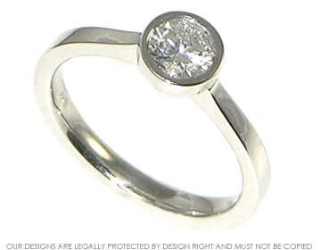 Platinum engagement ring with brilliant cut diamond