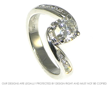 Bespoke platinum and diamond twist style  engagement ring. 