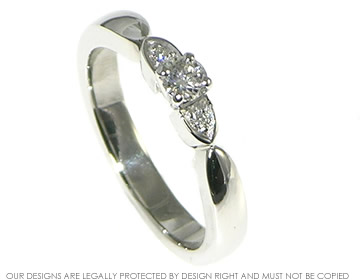 Platinum engagement ring with 0.17ct central H SI diamond and side diamonds totaling 0.01ct.