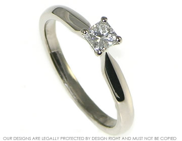 An 18ct white gold  princess cut diamond engagement ring.