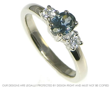 18ct white gold greeny blue 0.72ct sapphire engagament ring with diamonds totaling 0.23ct