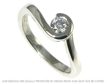 Bespoke platinum and diamond engagement ring inspired by Maori fish-hook  shapes