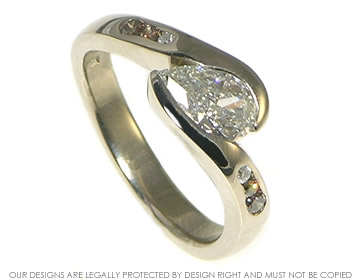 18ct white gold pear shaped diamond engagement ring and cognac diamonds 