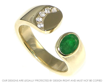 Bespoke 9ct gold ring using customers own 0.83ct emerald and own sapphires totaling 0.16cts.