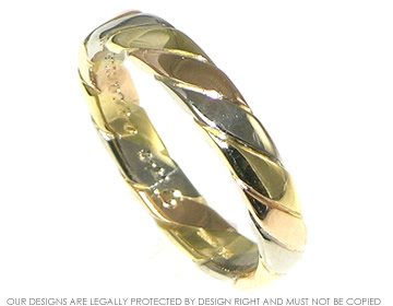 18ct Rose, Yellow and White gold celtic twist design wedding ring with a polished finish.