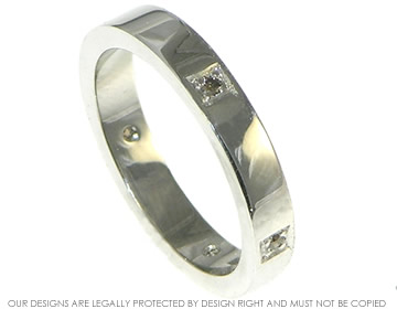 Bespoke platinum ladies contemporay style wedding ring. 