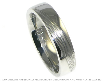 Bespoke palladium mans wedding ring with engraved lines and combination finish