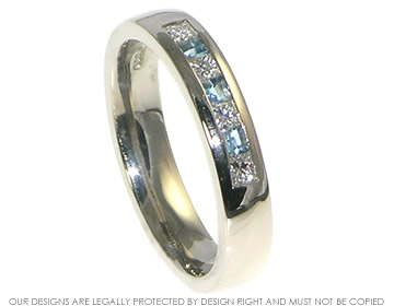 18ct white gold with rhodium plating eternity ring with channel set 2mm princess cut aquamarines 0.12ct and 2mm 0.22ct princess cut H Si diamonds.