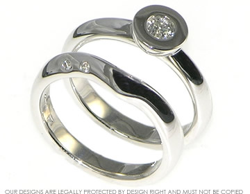 9ct white gold wedding band with rhodium plating with an apex finish and two 1.5mm brilliant cut H Si diamonds 0.03ct.