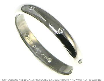 Equally spaced diamond and palladium eternity ring