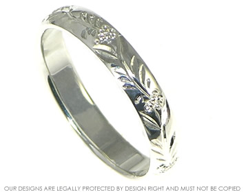 Floral inspired  Sterling Silver wedding band. 