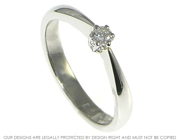 Platinum engagement ring with 0.11ct H SI diamond. 