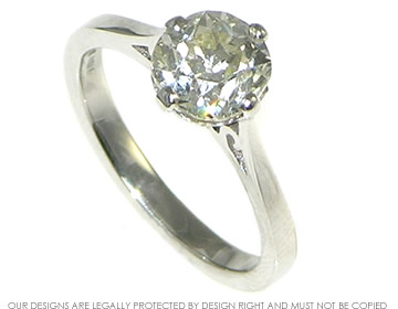 Platinum and diamond solitaire engagement ring