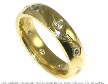 18ct yellow gold  diamond and sapphire eternity ring.