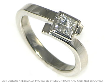 Platinum twist style diamond solitaire engagement ring