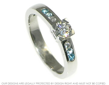 Platinum diamond and topaz engagement ring