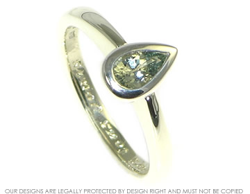 9ct white gold and green sapphire engagement ring