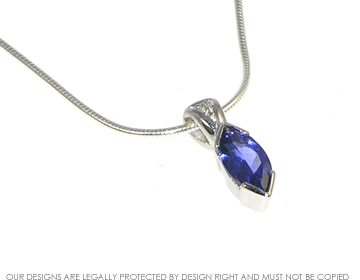 Bespoke 18ct white gold tanzanite diamond pendant.