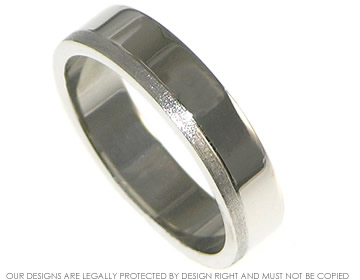 Palladium wedding band approximately 5mm wide.