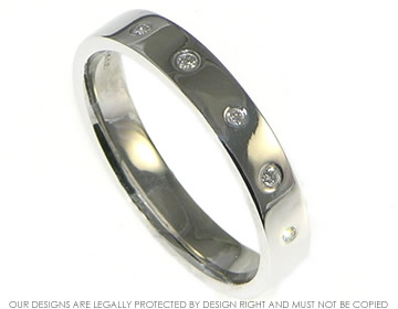 18ct white gold eternity ring with invisibly set diamonds.