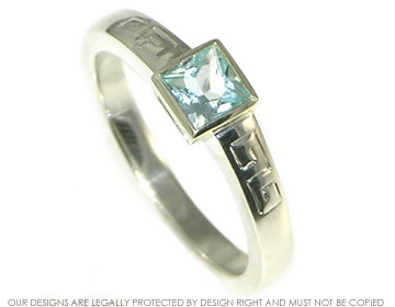 White gold and topaz engagement ring inspired by pre-Columbian motifs