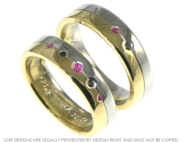 Bespoke pair of yellow gold and platinum rings with rubies and black diamonds