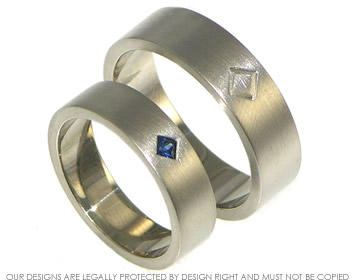 Bespoke 18ct white gold mans wedding ring with engraved square detailBespoke 18ct white gold ladies wedding ring with 2mm princess cut blue sapphire