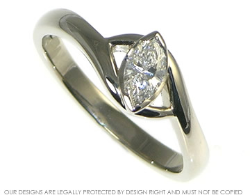 18ct white gold engagement ring with a marquise cut diamond 