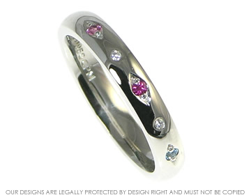 Palladium dress ring with aquamarine, ruby, tourmaline and H Si diamonds