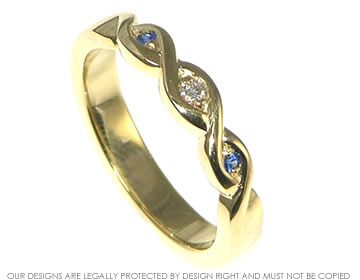 Bespoke 18ct Fairtrade yellow gold Celtic inspired diamond and sapphire engagement ring