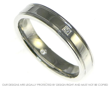 9ct white gold eternity ring with square diamonds and hand engraved lines. 