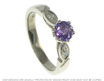 18ct white gold engagement with a purple sapphire 