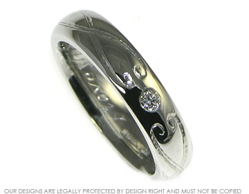 Daniel and Rebecca's platinum engraved engagement ring