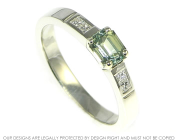 Bespoke 9ct white gold engagement ring with central 0.81ct emerald cut pale green sapphire.