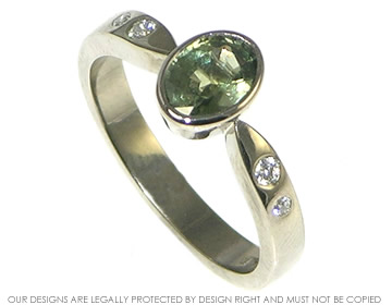 18ct white gold engagement ring with green sapphire