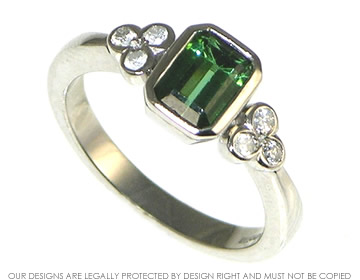 Platinum and green tourmaline engagement ring