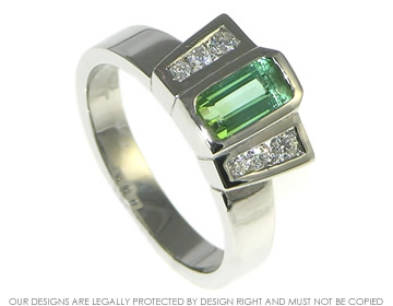 Bespoke palladium engagement ring with an emerald cut tourmaline and diamonds